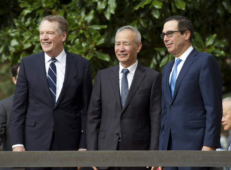 ASSOCIATED PRESS
                                Chinese Vice Premier Liu He — accompanied by U.S. Trade Representative Robert Lighthizer, left, and Treasury Secretary Steven Mnuchin — greeted the media before a minister-level trade meetings at the Office of the United States Trade Representative in Washington, Thursday.