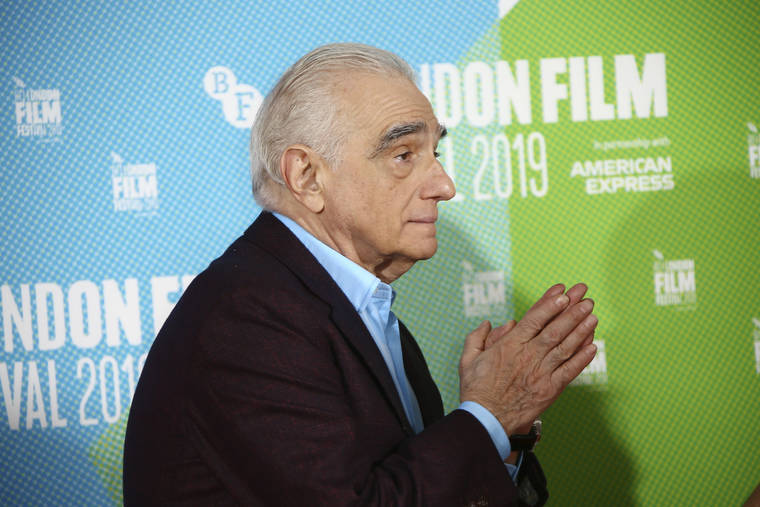 ASSOCIATED PRESS
                                Director Martin Scorsese poses for photographers at the photocall of the film ‘The Irishman’ as part of the London Film Festival, in central London today.
