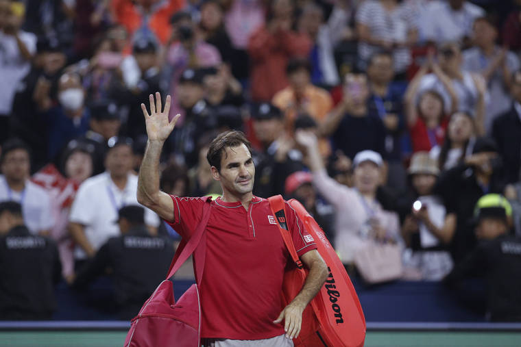 ASSOCIATED PRESS
                                Roger Federer of Switzerland waves to spectators as he leaves the court after he lost to Alexander Zverev of Germany in their men’s singles quarterfinals match at the Shanghai Masters tennis tournament at Qizhong Forest Sports City Tennis Center in Shanghai, China, on Oct. 11.