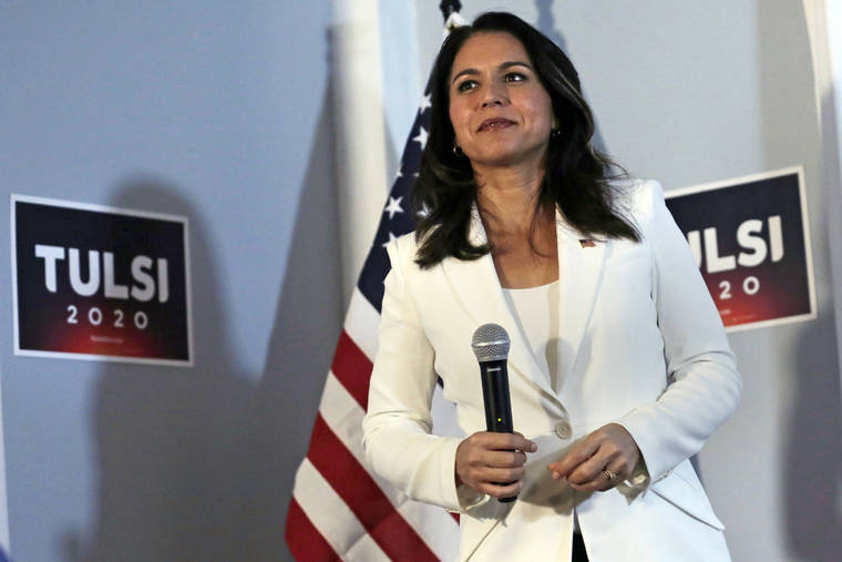 ASSOCIATED PRESS / Oct. 1
                                U.S. Rep. Tulsi Gabbard, D-Hawaii, seen here at a recent campaign stop in Londonderry, N.H., will appear with 11 other presidential hopefuls at the Democratic candidates debate today.