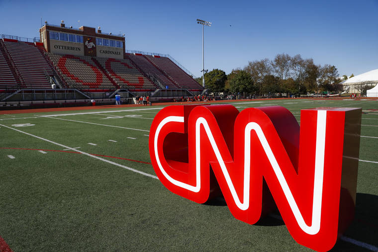 ASSOCIATED PRESS
                                A CNN sign rests on an athletic field outside the Clements Recreation Center where the CNN/New York Times will host the Democratic presidential primary debate at Otterbein University, Monday in Westerville, Ohio.