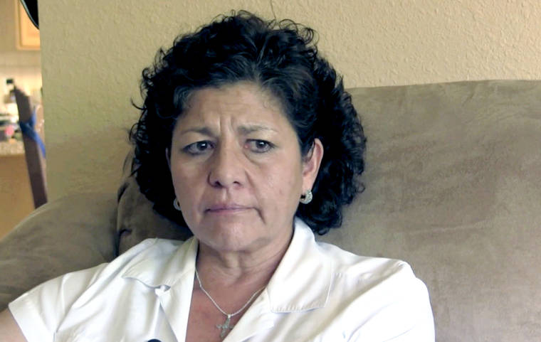 ASSOCIATED PRESS / July 14, 2015
                                Tina Cordova talks of her late father, Anastacio Cordova, in her Albuquerque, N.M., home in 2015. Cordova said she believes her father, who died in 2013 after suffering from multiple bouts of cancer, was affected by the atomic bomb Trinity Test in New Mexico since he lived in nearby Tularosa, N.M. as a child.