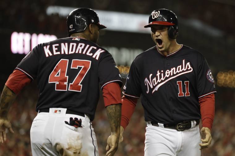ASSOCIATED PRESS
                                Washington Nationals’ Ryan Zimmerman reacts with Howie Kendrick after scoring during the first inning of Game 4 of the baseball National League Championship Series against the St. Louis Cardinals today in Washington.