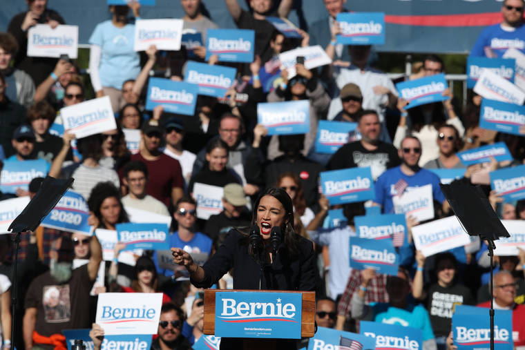 ASSOCIATED PRESS
                                Rep. Alexandria Ocasio-Cortez, D-N.Y., speaks during a campaign rally for Democratic presidential candidate Sen. Bernie Sanders, I-Vt., on Saturday in New York.