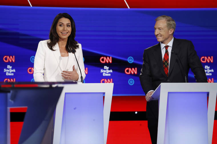 ASSOCIATED PRESS
                                Democratic presidential candidate Rep. Tulsi Gabbard, D-Hawaii, left, and businessman Tom Steyer participate in a Democratic presidential primary debate hosted by CNN and The New York Times on Tuesday in Westerville, Ohio.