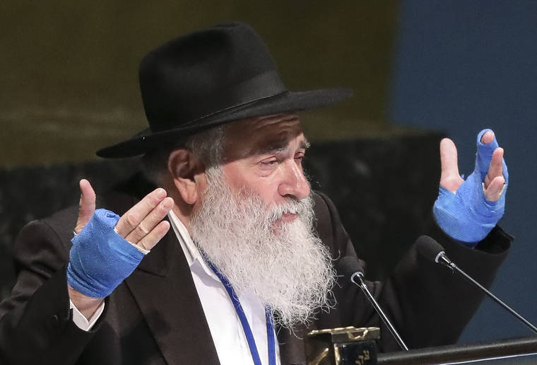 ASSOCIATED PRESS / June 26
                                Rabbi Yisroel Goldstein, senior rabbi of Chabad of Poway synagogue in San Diego, addresses the United Nations General Assembly’s meeting on combating anti-Semitism and other forms of racism and hate in the digital age at U.N. headquarters. The Poway synagogue was attacked in April, with one person killed and three others, including Goldstein, injured.