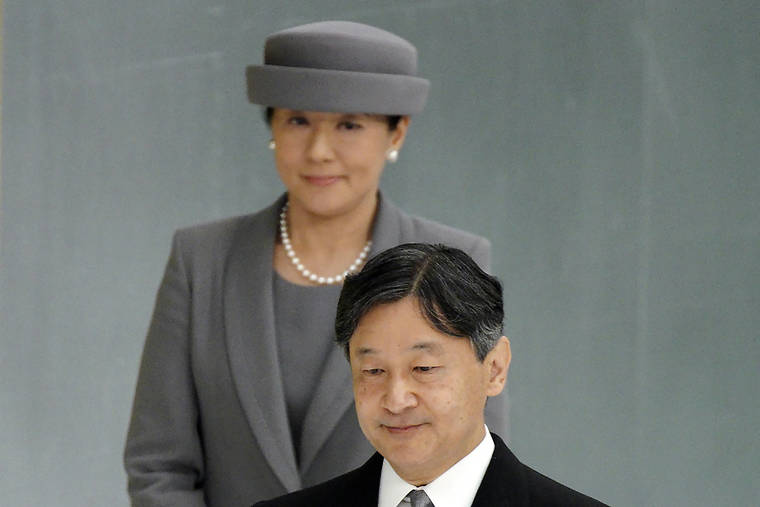 ASSOCIATED PRESS
                                Japanese Emperor Naruhito, accompanied by Empress Masako, walked to deliver his remarks during an Aug. 15 memorial ceremony for the war dead at Nippon Budokan Martial Arts Hall in Tokyo.