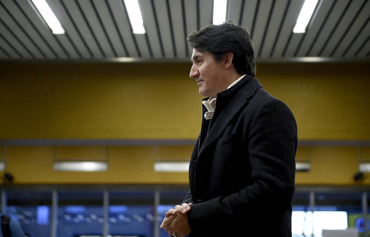 THE CANADIAN PRESS VIA ASSOCIATED PRESS
                                Canada’s Prime Minister Justin Trudeau greets commuters at a metro station in Montreal today.