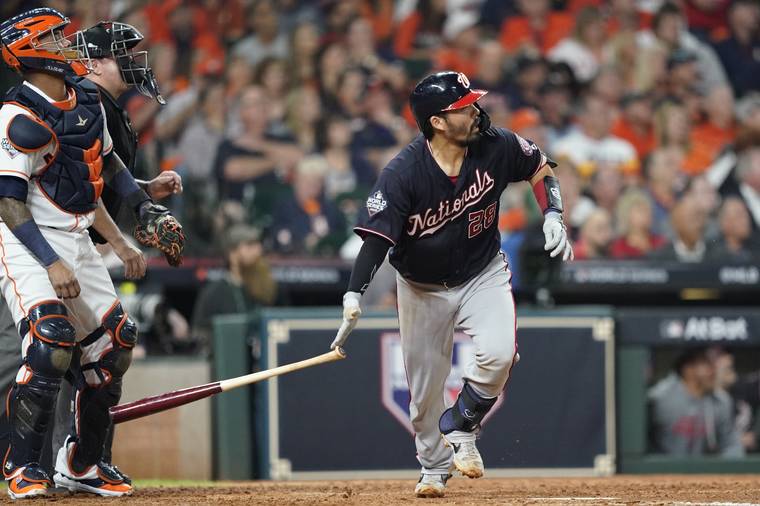ASSOCIATED PRESS
                                Washington Nationals’ Kurt Suzuki hits a home run in Game 2 of the World Series against the Houston Astros Wednesday in Houston.