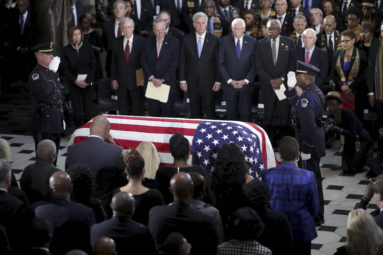 ALEX WONG/POOL VIA ASSOCIATED PRESS
                                The flag-draped casket of Rep. Elijah Cummings, D-Md., lay in state at the Capitol, today, in Washington.