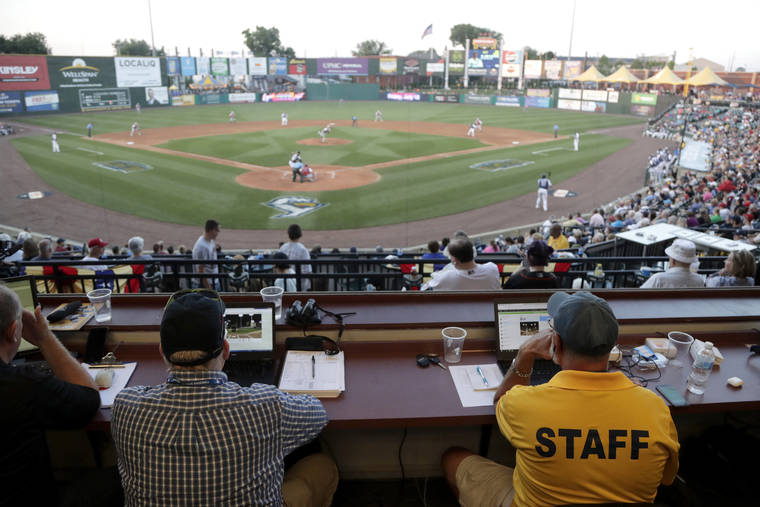 ASSOCIATED PRESS
                                Ron Besaw, right, operates a laptop computer as home plate umpire Brian deBrauwere, gets signals from radar with the ball and strikes calls during the fourth inning of the Atlantic League All-Star minor league baseball game in York, Pa., on July 10. The independent Atlantic League became the first American professional baseball league to let the computer call balls and strikes during the all star game.