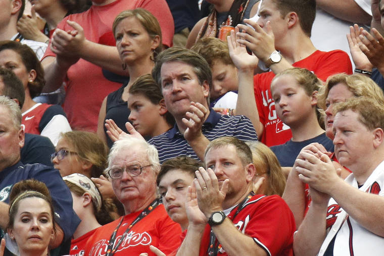 ASSOCIATED PRESS / 2018
                                Supreme Court nominee Brett Kavanaugh, center, applauds before the Major League Baseball All-Star Game at Nationals Park in Washington on July 17, 2018.