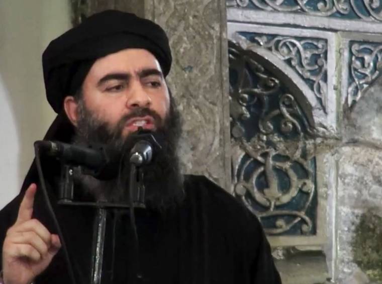 ASSOCIATED PRESS FILE
                                This file image made from video posted on a militant website on July 5, 2014, purports to show the leader of the Islamic State group, Abu Bakr al-Baghdadi, delivering a sermon at a mosque in Iraq during his first public appearance.
