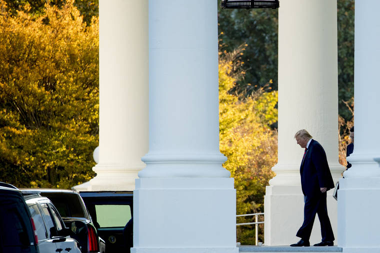 ASSOCIATED PRESS
                                President Donald Trump walks out of the North Portico of the White House in Washington on Monday.