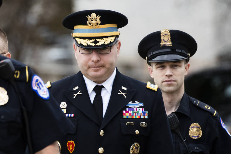 ASSOCIATED PRESS
                                Army Lieutenant Colonel Alexander Vindman, a military officer at the National Security Council, center, arrived on Capitol Hill in Washington, today, to appear before a House Committee on Foreign Affairs, Permanent Select Committee on Intelligence, and Committee on Oversight and Reform joint interview with the transcript to be part of the impeachment inquiry into President Donald Trump.