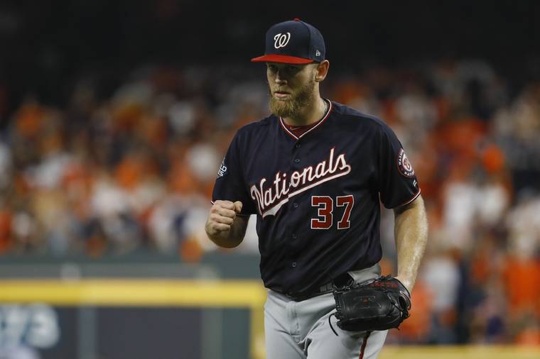 ASSOCIATED PRESS
                                Washington Nationals starting pitcher Stephen Strasburg reacts after Houston’s Michael Brantley grounded out to end the fifth inning.