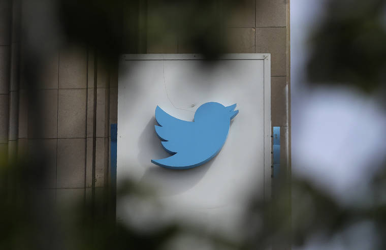 ASSOCIATED PRESS
                                A sign outside of the Twitter office building, July 9, in San Francisco. Twitter is banning all political advertising from its service, saying social media companies give advertisers an unfair advantage in proliferating highly targeted, misleading messages.