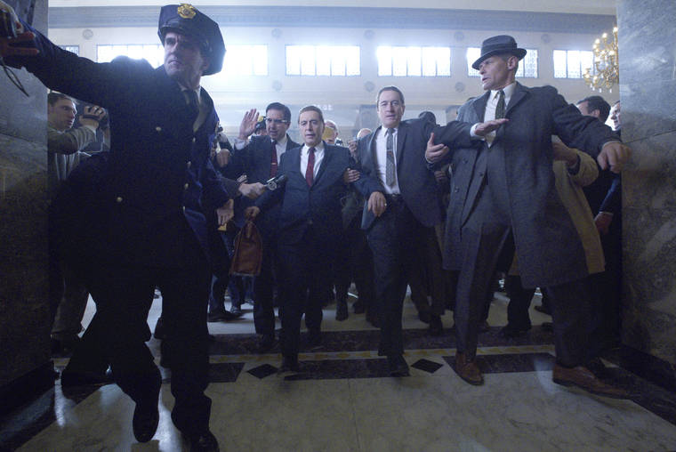 NETFLIX VIA ASSOCIATED PRESS
                                This image released by Netflix shows Al Pacino, center left, and Robert De Niro, center right, in a scene from “The Irishman.”