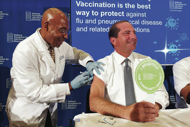 ASSOCIATED PRESS
                                The flu forecast is cloudy, and it’s too soon to know whether the U.S. is in for a third miserable season in a row, but health officials said not to delay vaccination. B.K. Morris, a nurse with MedStar Visiting Nurses Association, gives a flu shot to Secretary of Health and Human Services Alex Azar during a news conference in Washington.