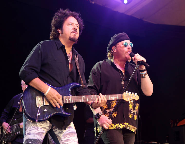 ASSOCIATED PRESS
                                Steve Lukather, left, and Joseph Williams of the band Toto perform in concert at Pier Six Pavilion in Baltimore in 2015.