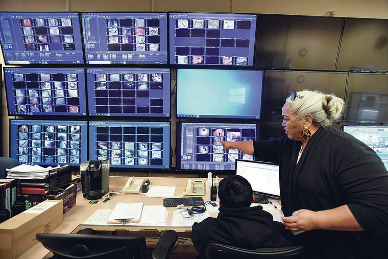 BRUCE ASATO / BASATO@STARADVERTISER.COM
                                Telecommunications supervisor Leann Young on Monday referred to one of the camera views on the bank of monitors in the current security center at Hawaii State Hospital. For at least a year since August 2018, parts of the 25-year-old surveillance system in the hospital were not operational.