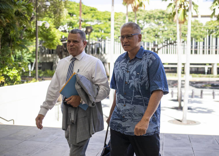 CINDY ELLEN RUSSELL / CRUSSELL@STARADVERTISER.COM
                                Louis Kealoha appeared at federal court this afternoon with his attorney Rustam Barbee.