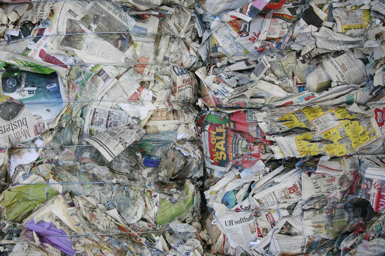 CINDY ELLEN RUSSELL / 2008
                                Recycled paper and newspaper at RRR Recycling Services Hawaii in Campbell Industrial Park. Effective Oct. 16, Hawaii County’s designated recycling and transfer stations will no longer be able to accept plastics and papers such as newspapers due to significant decreases in global recycling markets.
