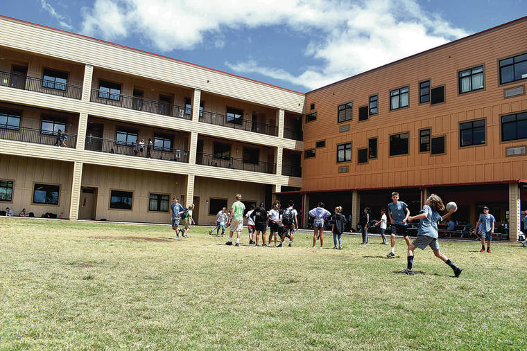 MEGAN MOSELEY / SPECIAL TO THE STAR-ADVERTISER
                                Students play outside at the Kihei Charter School on Maui.