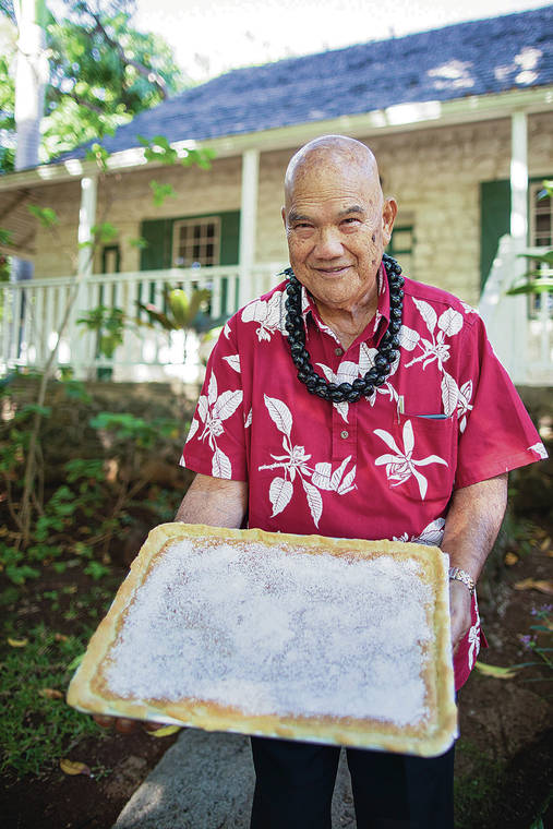 ANNA KIM / SPECIAL TO THE STAR-ADVERTISER
                                Ernie Wilson Jr. presents his lilikoi bars at the Bailey House Museum in Wailuku.