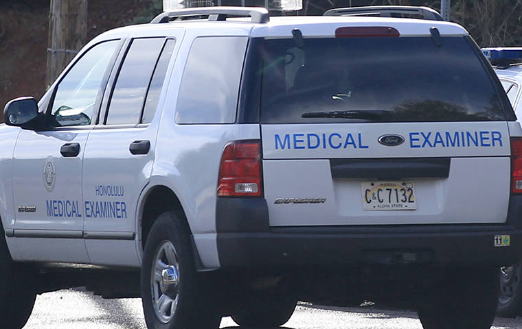 STAR-ADVERTISER / 2013
                                Medical Examiner personnel attend to a crime scene on Mililani Cemetery Road in Waipahu.