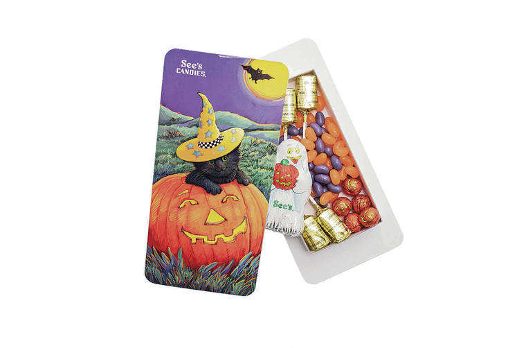 CINDY ELLEN RUSSELL / CRUSSELL@STARADVERTISER.COM
                                See’s Candies sells a Halloween Cat Box packed with four lollipops (two chocolate and two butterscotch), jack-o’-lantern milk chocolate balls, a milk chocolate ghost and two 3-ounce bags of sour grape and tangerine jelly beans.
