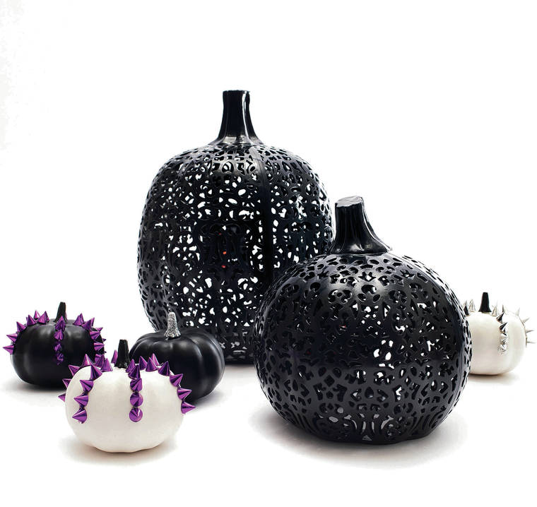 CINDY ELLEN RUSSELL / CRUSSELL@STARADVERTISER.COM
                                At Target’s Hyde & EEK! Boutique, there are all manner of pumpkins to choose from. The black plastic Laser Weave Pumpkins feature lacy cut-out accents adding a more delicate look to your decor. Or opt for a little rock ’n’ roll with an eight-pack of Mini Studded Pumpkins.