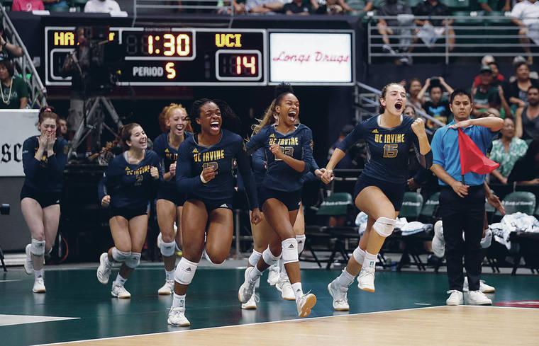 CINDY ELLEN RUSSELL / CRUSSELL@STARADVERTISER.COM
                                The UC Irvine Anteaters stormed the court after the stunning victory over UH.