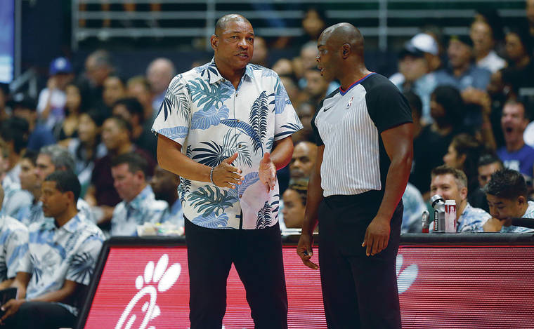 JAMM AQUINO/JAQUINO@STARADVERTISER.COM
                                Los Angeles Clippers coach Doc Rivers talked with referee Courtney Kirkland during Thursday’s preseason game at the Stan Sheriff Center.