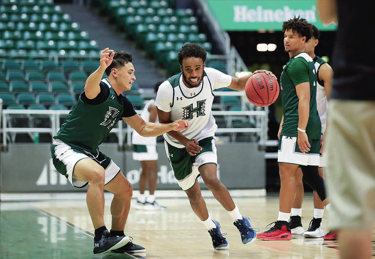 JAMM AQUINO / JAQUINO@STARADVERTISER.COM
                                Hawaii guard Ahmed Ali participated in the Rainbow Warrior basketball team’s first two practices before a health issue forced him out of action.