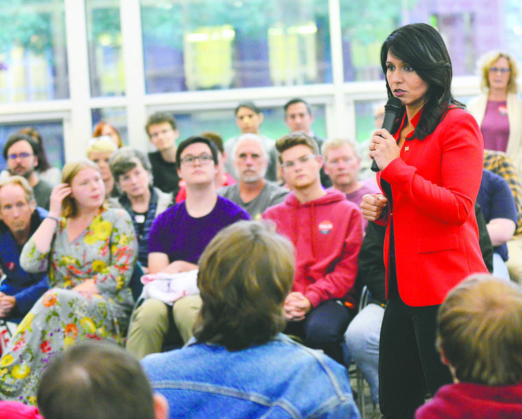ASSOCIATED PRESS / Oct. 3
                                Democratic presidential candidate U.S. Rep. Tulsi Gabbard, D-Hawaii, said on her presidential campaign website today that she will not seek reelection to Congress in 2020. Gabbard holds a town hall at Keene State College in Keene, N.H.