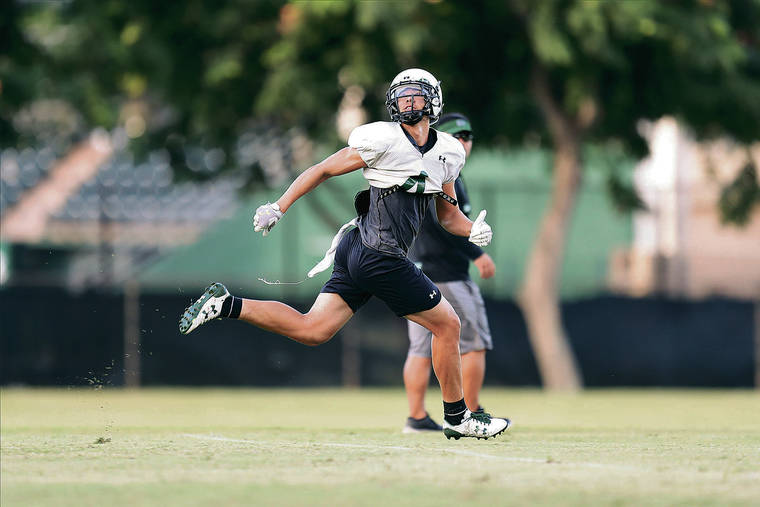 ANDREW LEE / SPECIAL TO THE STAR-ADVERTISER
                                Kumoku Noa ran down the field during Wednesday’s practice. Noa can play slot, wideout and return punts.