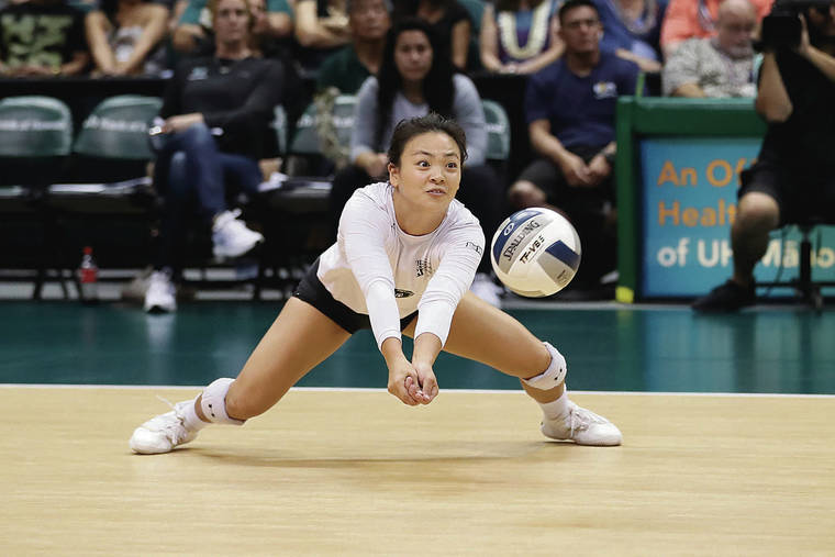 ANDREW LEE / SPECIAL TO THE STAR-ADVERTISER
                                Hawaii’s Rika Okino went low for a dig during the Rainbow Wahine volleyball team’s win over Cal State Fullerton on Saturday at the Stan Sheriff Center.