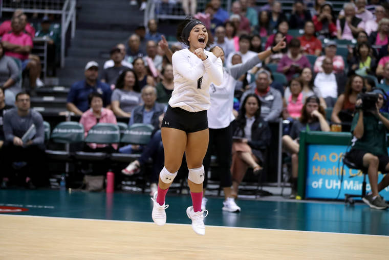 ANDREW LEE / SPECIAL TO THE STAR-ADVERTISER
                                Hawaii’s Kyra Hanawahine celebrates after the Rainbow Wahine scored a point during the second set.