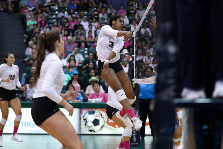ANDREW LEE / SPECIAL TO THE STAR-ADVERTISER
                                Hawaii’s Amber Igiede puts down a kill in the second set.