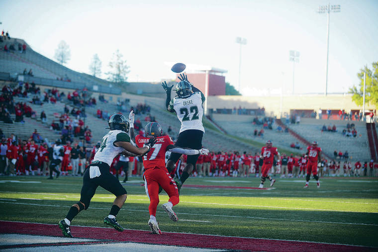 ANTHONY JACKSON / SPECIAL TO THE STAR-ADVERTISER
                                Hawaii safety Ikem Okeke sealed the Rainbow Warriors’ win at New Mexico with an interception late in the fourth quarter on Saturday.
