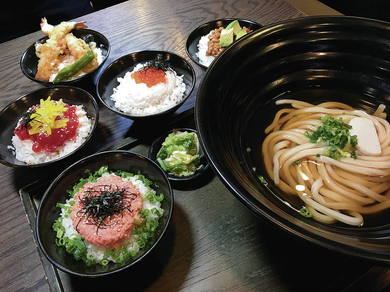 NADINE KAM / SPECIAL TO THE STAR-ADVERTISER
                                A $9.95 kamaaina lunch special at Tsurutontan features an udon bowl accompanied by one mini rice bowl.