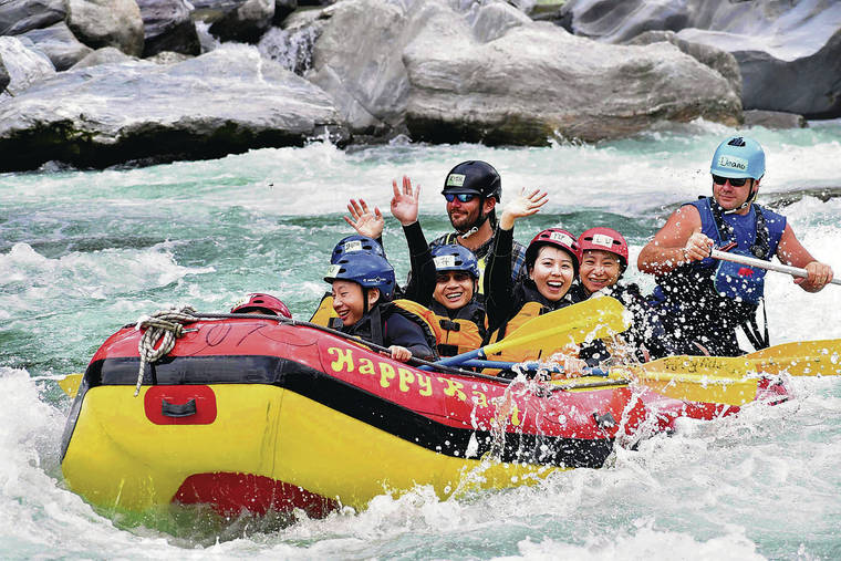 JAPAN NEWS-YOMIURI
                                Tourists enjoy rafting down the Yoshino River in Otoyo, Japan.