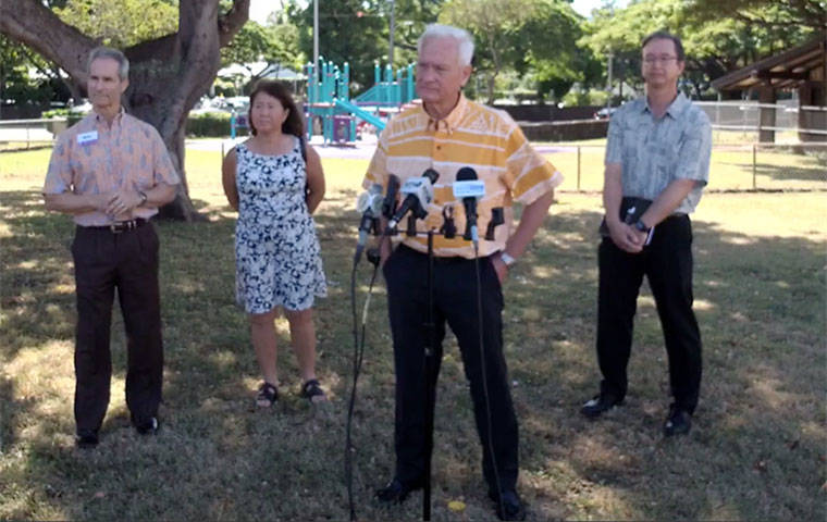 COURTESY CITY AND COUNTY OF HONOLULU
                                Honolulu Mayor Kirk Caldwell, second from right, spoke during a press conference at Kamamalu Park today.