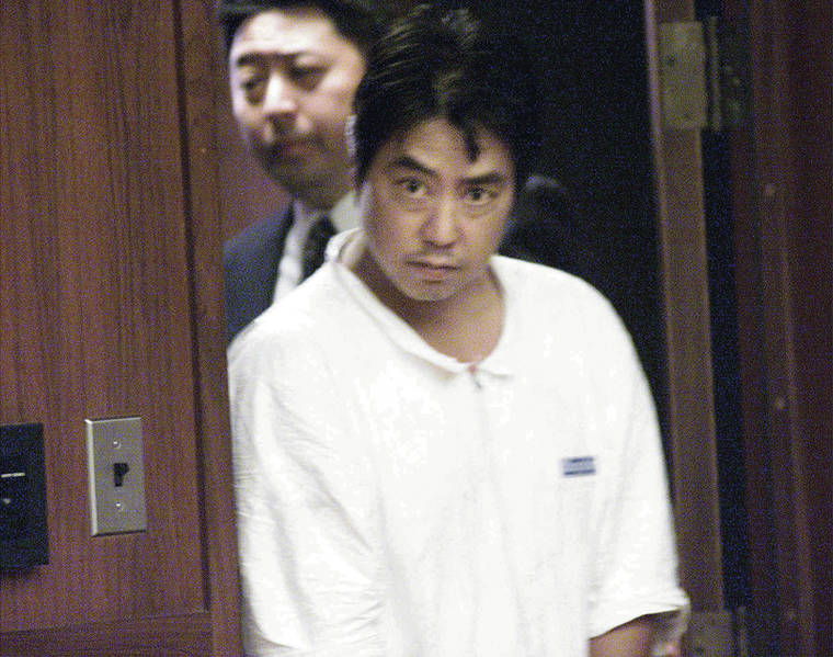 ASSOCIATED PRESS / 1999
                                Xerox repair technician Byran Uyesugi pleaded not guilty to one count of first-degree murder and seven counts of second-degree murder in District Court on Nov. 5, 1999.