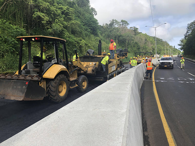 COURTESY HAWAII DEPARTMENT OF TRANSPORTATION
                                In this undated photo, crews work on repairs to Pali Highway.