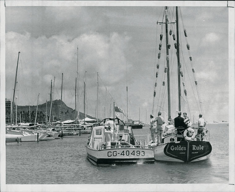 STAR-ADVERTISER
                                The sailboat Golden Rule was towed into harbor by a Coast Guard patrol boat on May 2, 1958.