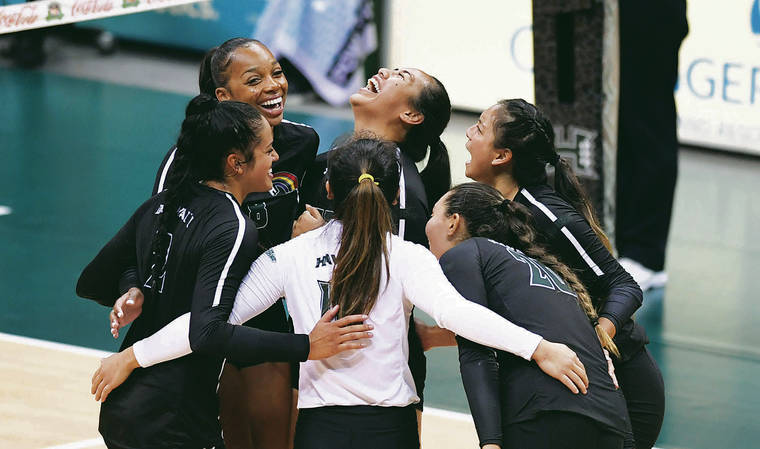 BRUCE ASATO / BASATO@STARADVERTISER.COM
                                Hawaii players celebrate a point in the third set of the Cal Poly vs Hawaii volleyball match at Stan Sheriff Center, UH Manoa, November 3, 2019.