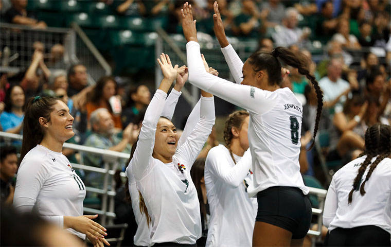 CINDY ELLEN RUSSELL / CRUSSELL@STARADVERTISER.COM
                                Hawaii’s Bailey Choy (7) and Skyler Williams (8) exchanged high-fives after teammate Norene Iosia made a service ace during Friday’s match. The Hawaii women’s volleyball team improved six spots to 11 in today’s Ratings Percentage Index, the computer-generated system that ranks strength of schedule.