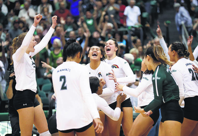 CINDY ELLEN RUSSELL / CRUSSELL@STARADVERTISER.COM
                                The Rainbow Wahine converged on Norene Iosia (center left) after her service ace won the fifth set against the UC Santa Barbara Gauchos at Friday’s match. The Rainbow Wahine defeated the Gauchos 3-2, 25-19, 22-25, 21-25, 25-18, 17-15.